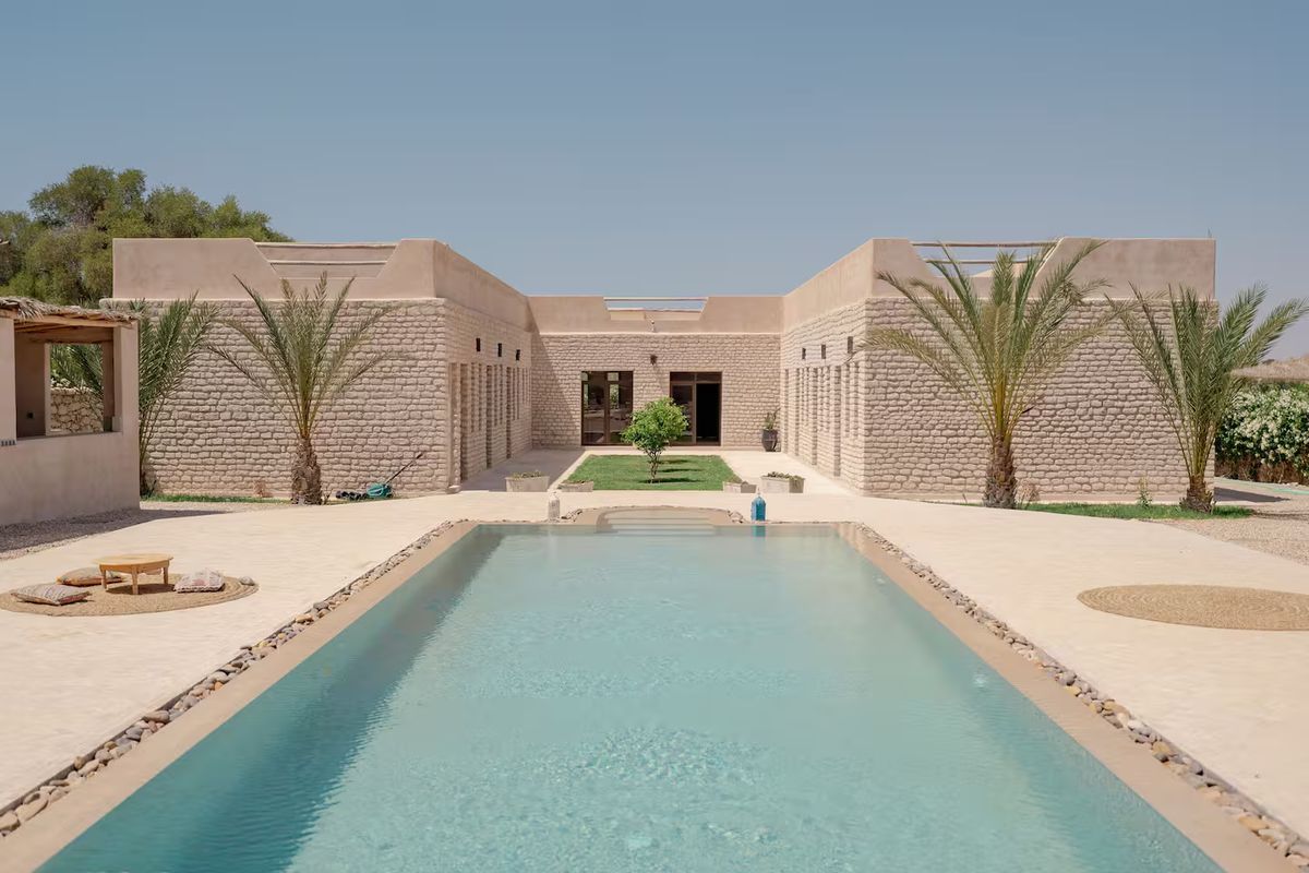 The villa and pool at golden hour